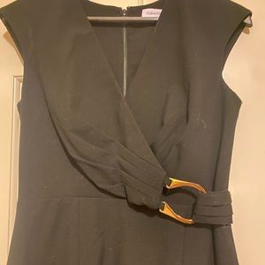 Calvin Klein black dress with great detailing. Never worn size 6